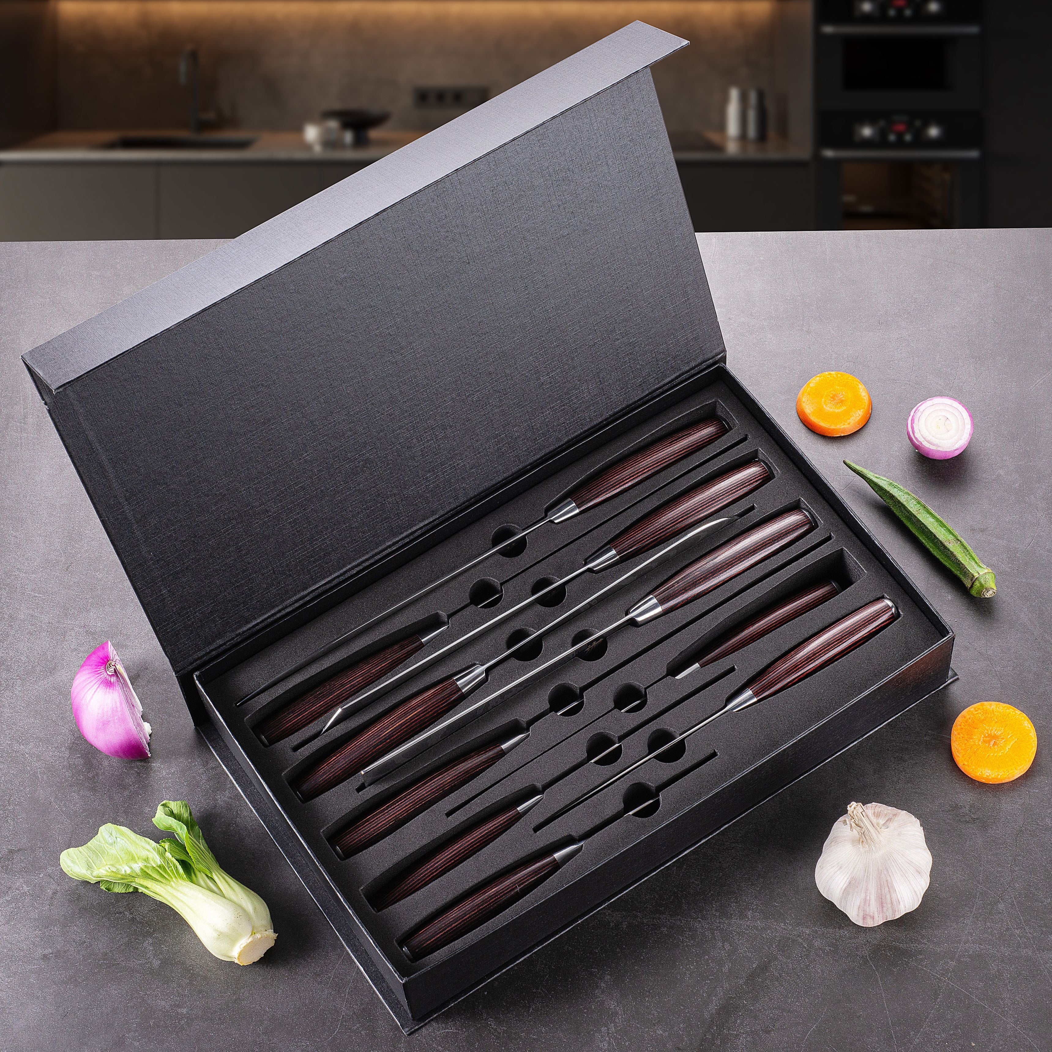 A single green leaf against a white background.